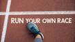 © AhmadNubhan - Footwear on the Track: Running Your Own Race