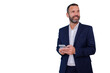 © Komora - Businessman communicating on smartphone, standing with a smile, looking away, planning and anticipating future success