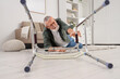 © Pixel-Shot - Senior man lying on floor after fall with walker at home
