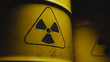 © AddMeshCube - Radioactive symbol on yellow toxic waste barrel close-up. 3d rendering