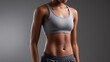 © Curioso.Photography - Athletic female torso wearing a sports bra showcasing fitness and healthy lifestyle concept.