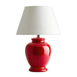 © Raehan - Shiny red ceramic table lamp with a white tapered drum shade, casting soft light