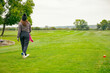 © Roman_23203 - Woman golfer performs a strong golf shot to fairway