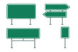 © serdon - Blank green highway signs with white borders and poles
