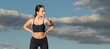 © Mountains Hunter - A young slim athletic girl in sportswear with snakeskin prints performs a set of exercises. Fitness and healthy lifestyle.