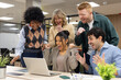 © luisrojasstock - Diverse business team celebrating success at office
