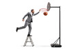© Ljupco Smokovski - Businessman climbing a ladder and scoring a point with a basketball