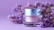 © tashechka - Lavender flowers surround cream jar on purple background in a simple setup