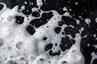 © mehaniq41 - Abstract view of soap bubbles forming artistic patterns on black surface. Contrasting white foam and dark background create dynamic visual effect. Neural network AI generated