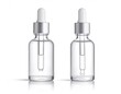 © Hmdx - Two Clear Glass Dropper Bottles with Serum or Essential Oil