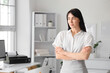 © Pixel-Shot - Portrait of young secretary  in office