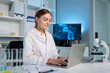 © Kawee - Caucasian female scientist in white lab coat working in the laboratory.