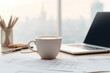 © D.APIWAT - Coffee cup on office desk beside laptop and architectural blueprint in bright modern workspace with city window background and copy space for business design planning concept