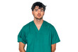 © carballo - isolated white portrait of a young doctor or nurse