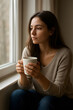 © Amir - young woman drinking tea
