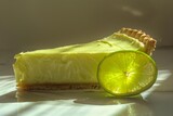 Delicious key lime pie slice with a fresh lime wedge, showcasing the vibrant citrus flavors