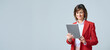 © Stock 4 You - Focused middle aged businesswoman using touchscreen pc for office investment work. Mature ceo professional business leader executive woman working isolated on tablet computer. Web banner, copy space