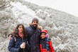 © Antonio Recena - Bearded Father Aged Forty Posing with His Twelve Year Old Daughter and Ten Year Old Son in a Snowy Forest on a Winter Day