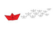 © Maureen - Red paper boat leading origami fleet: minimalist leadership concept