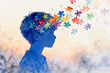 © 沈军 贡 - Silhouette of a blue boy with colorful puzzle pieces symbolizing thoughts, mind, and cognitive development, in a dreamy, abstract watercolor illustration.