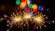 © AL - Sparklers shining brightly in the night with colorful lights