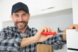 © auremar - a contractor repairman assembling furniture