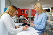 © auremar - beauty clinic receptionist at work