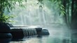 © Bon - Tranquil outdoor hot spring, waterfall, lush bamboo forest