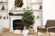 © New Africa - Beautiful Christmas tree near fireplace at home