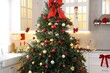 © New Africa - Beautiful Christmas tree and other festive decor in kitchen
