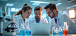 © Pete - Three scientists in white lab coats gather around laptop discussing research data. In modern laboratory setting with microscopes, chemical beakers visible. Teamwork, analysis drive scientific