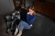 © Pixel-Shot - Upset young woman sitting on sofa at home. International Stress Awareness Week