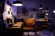 © Pixel-Shot - Interior of dark programmer's office with desks and glowing lamps at night