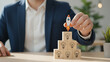 © MuhammadFarooq - Idea creation and innovative product launching concept. Wooden block with rocket and idea generation icons. Idea creation, innovation and the launch of a new product from concept, Business Innovation