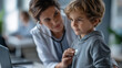 © Denis Yevtekhov - Faceless doctor examining child patient by stethoscope, cute boy at physician appointment, medicine and healthcare concept, pediatric examination, defocused people, with copy space