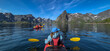© grafxart - Woman With Kayak On Calm Fjord Near Hamnoy And Reine On Lofoten Islands In Norway