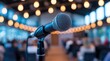 © Genowefa - Blurred photo of conference hall or seminar room with microphone over it. High quality