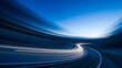 © Emonahmed - Blurry highway with light trails on a blue background at dusk or dawn
