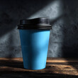 © Selvam - Blue Coffee Cup with Black Lid Under Directional Ligh