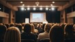 © Basir  - Empty theater with stage and blurred audience anticipating a performance or event