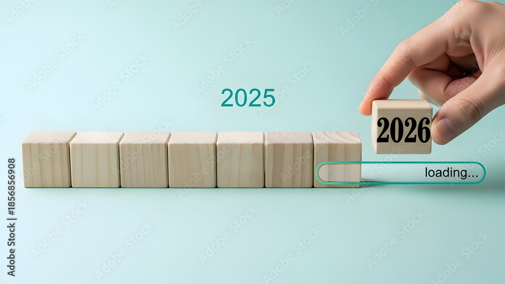 2026 Loading Progress with Wooden Blocks Description: Hand placing a ...