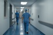 © cff999 - two people walking down a hallway in a hospital
