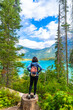 © unai - Hiker admiring emerald lake in banff national park, canadian rockies