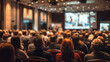 © RicardoLuiz - Audience View From Behind in a Large Conference Hall During a Presentation Event
