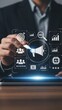 © vadosloginov - Businessman interacts with digital marketing icons on screen
