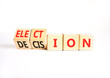 © Dzmitry - Election and decision symbol. Concept words Election to Decision on beautiful wooden cubes. Beautiful white table white background. Business, election and decision concept. Copy space.
