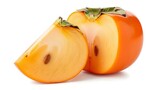 Fresh autumn persimmon with a detached wedge, emphasizing the rich color and healthy appeal of this exotic fruit.