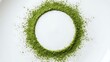 © Design Empire - A perfect circle of vibrant green matcha powder delicately arranged on a pristine white surface
