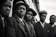 © ink drop - A vintage black and white photo of Caribbean citizens arriving on a boat to the UK after the war