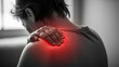 © MSTSAHERA - Shoulder Pain Relief: Person holding painful aching shoulder with red glowing inflammation area for healthcare and medical concepts